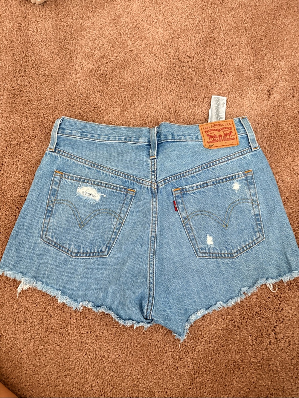 Levi's Light Blue Frayed Hem Denim Shorts